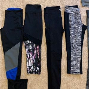 7 pairs of workout tights and Small sports bra